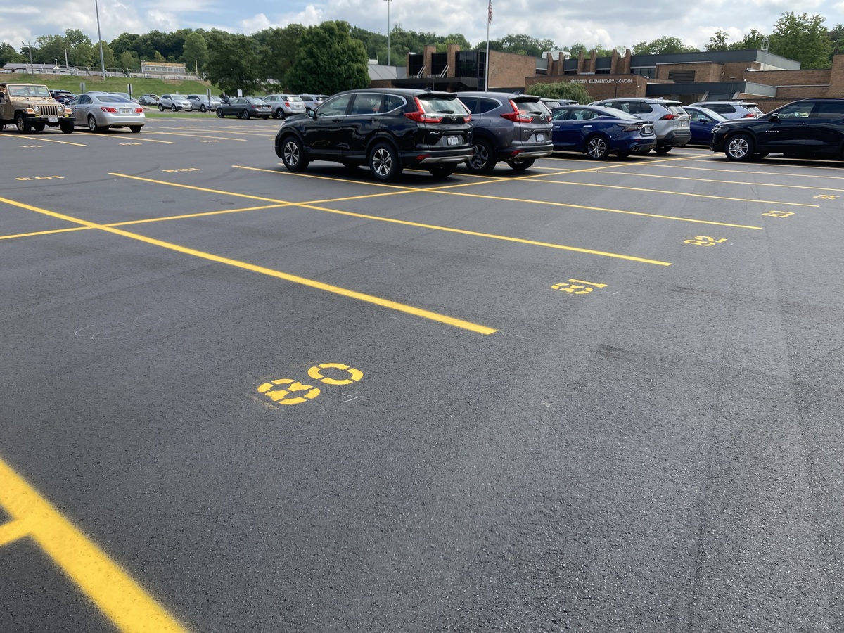 Photo of a recently repaved parking lot